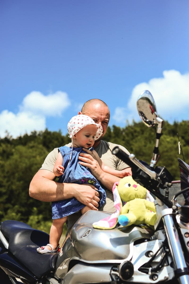 man holding toddler